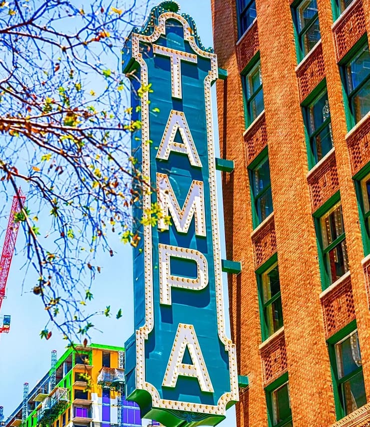 A large sign that says tampa on the side of a building.